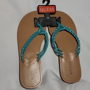 Never worn Guess flip flops